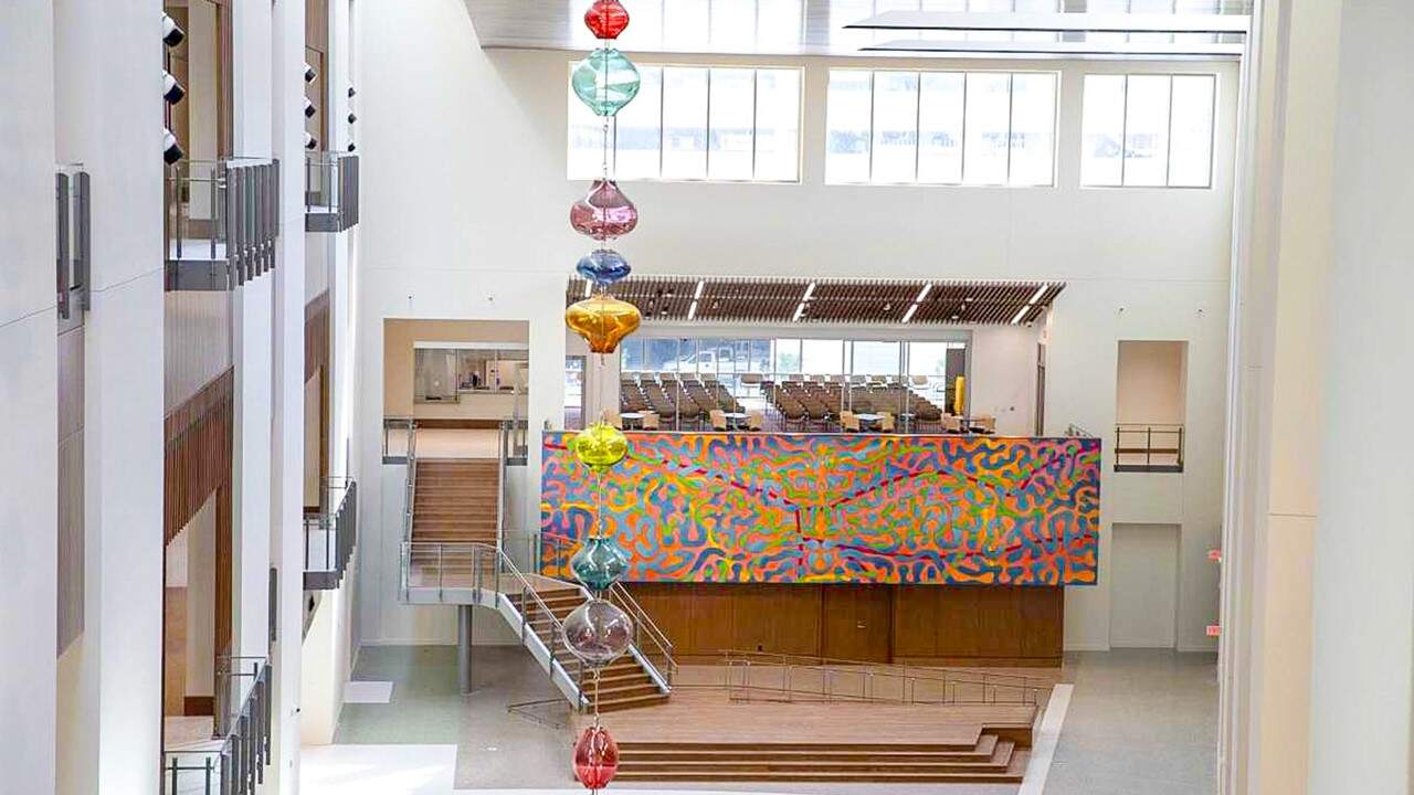 Colorful glass pendants hanging from the interior ceiling of the San Antonio Federal Courthouse